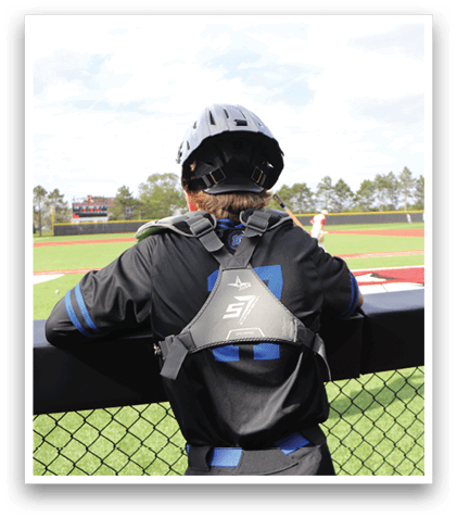 A person wearing a black helmet and a blue and black backpack. Description generated by AI