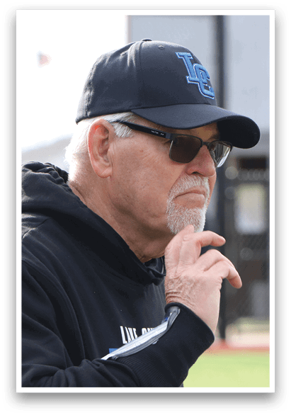 A man wearing a black hat and a black hoodie. Description generated by AI