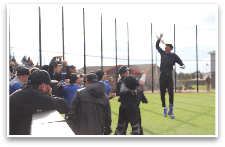 A baseball player is jumping in the air. Description generated by AI