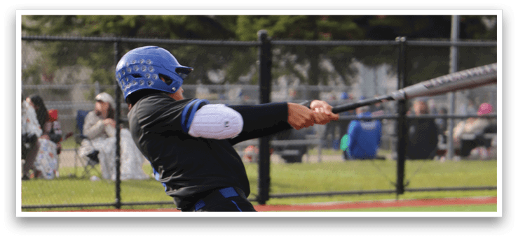 A baseball player is swinging a bat at a ball. Description generated by AI