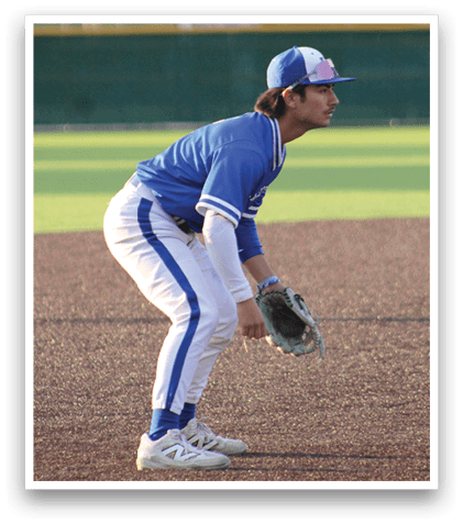 A baseball player is kneeling on the ground with his glove on. Description generated by AI