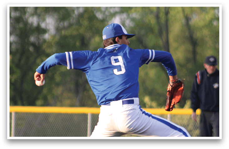 A baseball player wearing a blue shirt and white pants is throwing a ball. Description generated by AI
