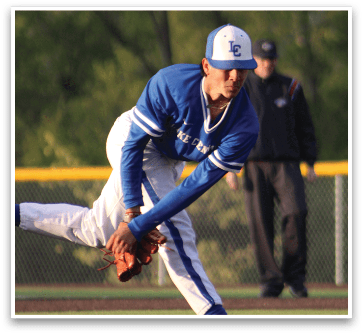 A baseball player catching a ball. Description generated by AI