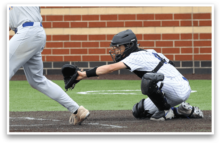 A baseball player is swinging a bat at a ball. Description generated by AI