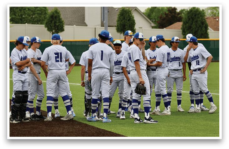 A group of baseball players wearing blue and white uniforms. Description generated by AI