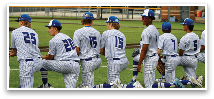 Baseball players wearing blue and white uniforms. Description generated by AI