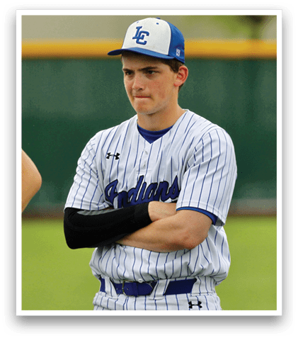 A baseball player wearing a blue and white uniform. Description generated by AI
