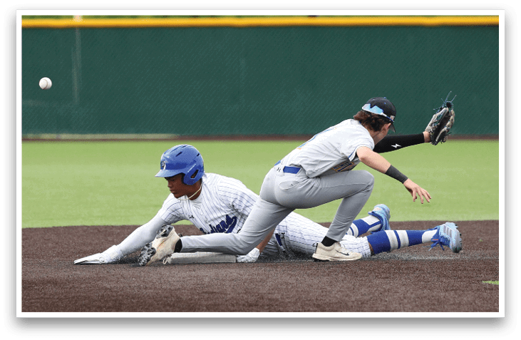 A baseball player slides into a base. Description generated by AI