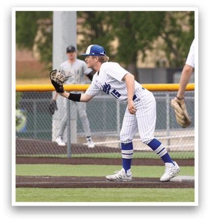 A baseball player catching a ball. Description generated by AI