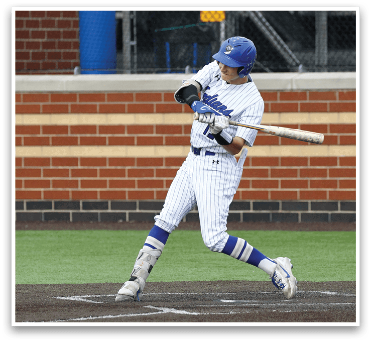 A baseball player is swinging a bat at a ball. Description generated by AI