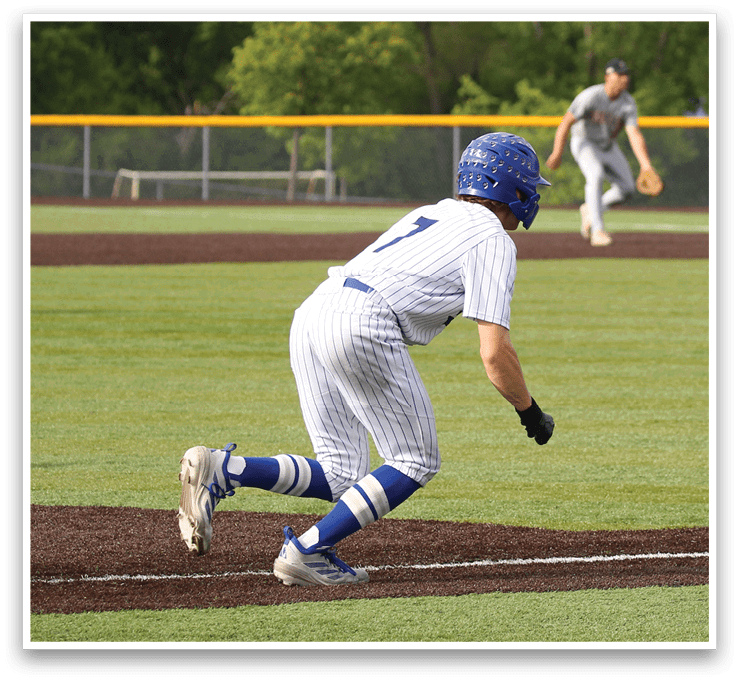 A baseball player is running to first base. Description generated by AI
