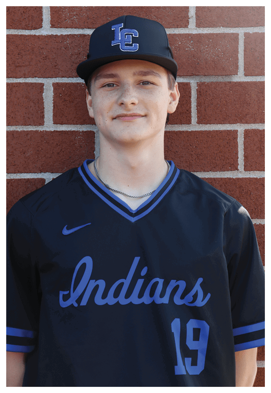 A man wearing a black and blue jersey with the number 19 on it. Description generated by AI