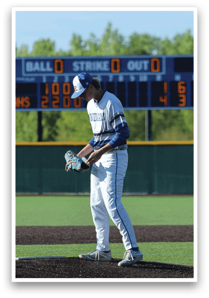 A baseball player is standing on the field with a baseball glove. Description generated by AI