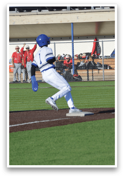 A baseball player is running to first base. Description generated by AI