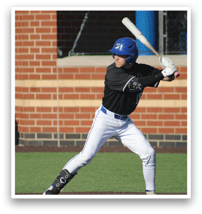 A baseball player in a black shirt and white pants is swinging a bat. Description generated by AI