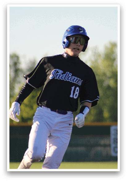 A baseball player wearing a black and blue jersey. Description generated by AI