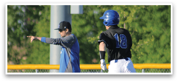 Two baseball players on a field. Description generated by AI