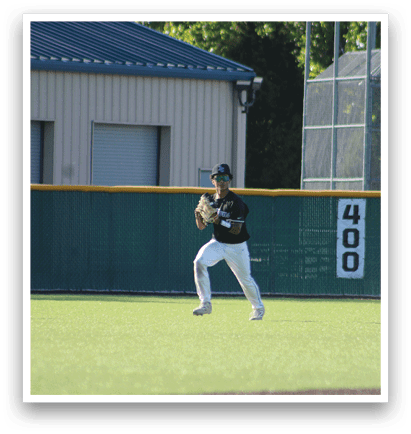 A baseball player is wearing a glove and is in the process of catching a ball. Description generated by AI