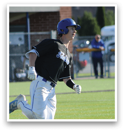 A baseball player wearing a blue helmet and white uniform. Description generated by AI