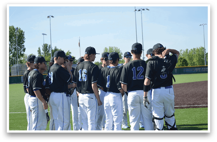 Baseball players standing on a field. Description generated by AI