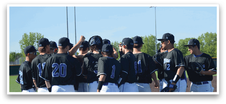 A group of baseball players wearing black and white uniforms. Description generated by AI