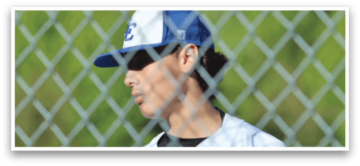 A man wearing a blue and white baseball cap. Description generated by AI