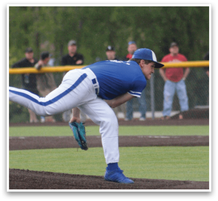 A baseball player is bending over on the field. Description generated by AI