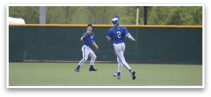 Two baseball players on a field. Description generated by AI