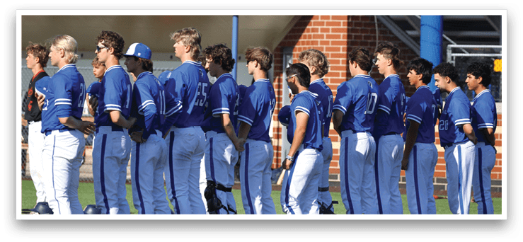 A group of baseball players wearing blue uniforms. Description generated by AI