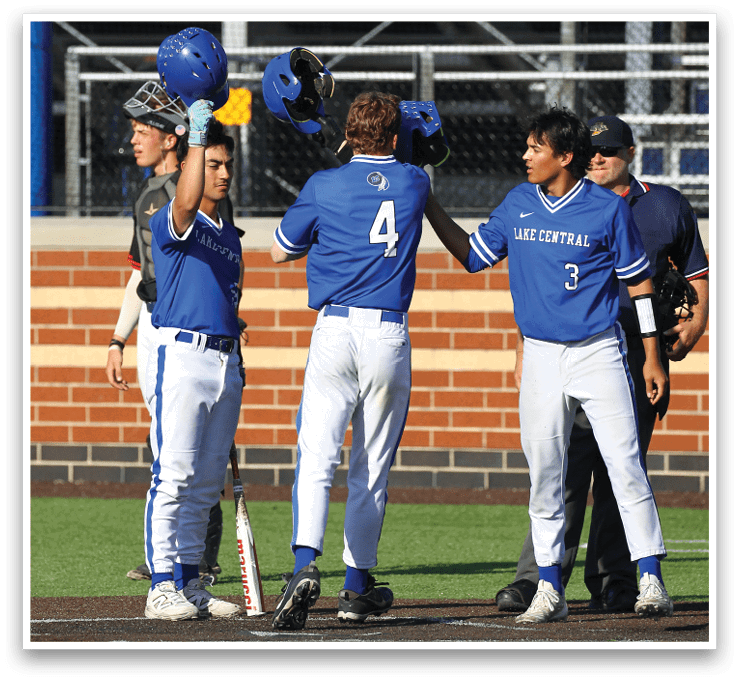 Three baseball players wearing blue and white uniforms. Description generated by AI