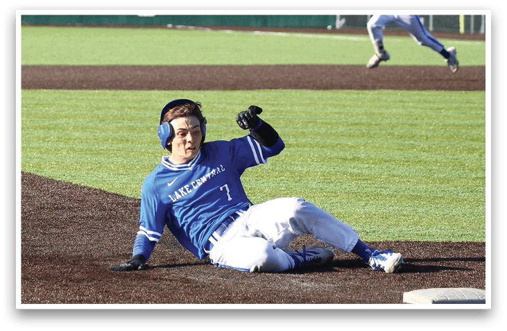 A baseball player slides into a base. Description generated by AI
