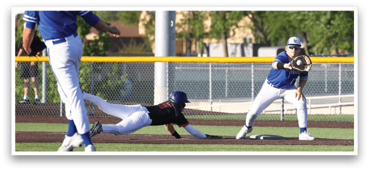 A baseball player slides into home plate. Description generated by AI