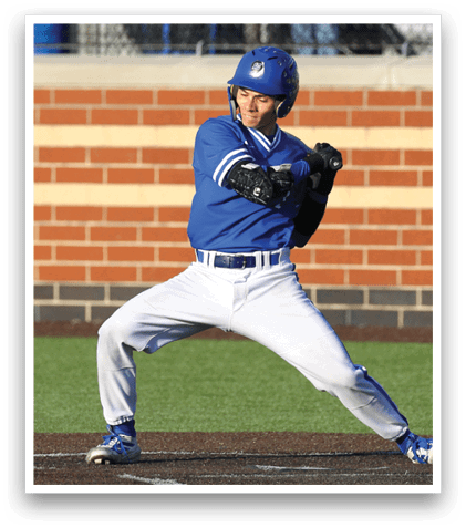 A baseball player in a blue uniform is swinging a bat. Description generated by AI