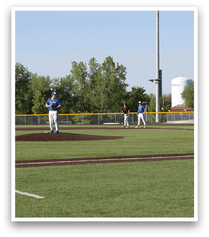 A baseball game is taking place on a field. Description generated by AI