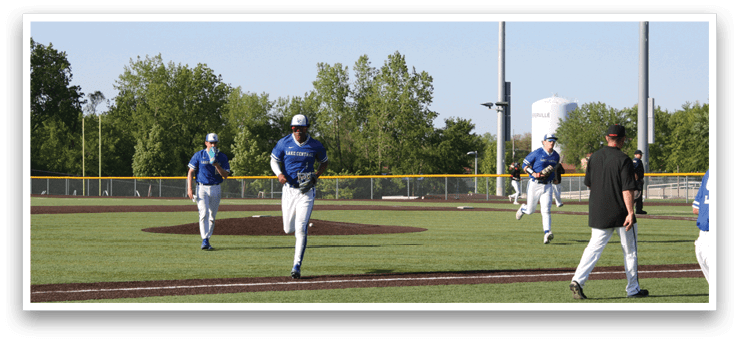 A baseball player running on the field. Description generated by AI