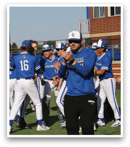 Baseball players celebrating on the field. Description generated by AI