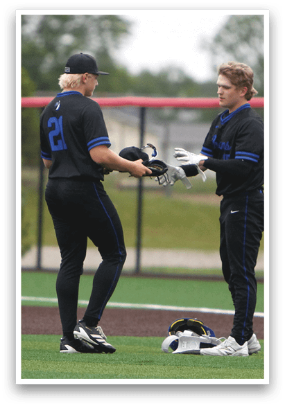Two baseball players shaking hands. Description generated by AI