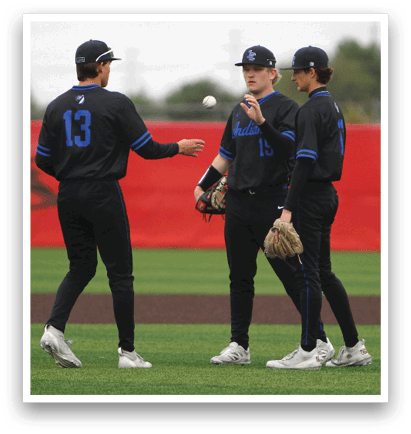 Three baseball players wearing black uniforms and blue numbers on their shirts. Description generated by AI
