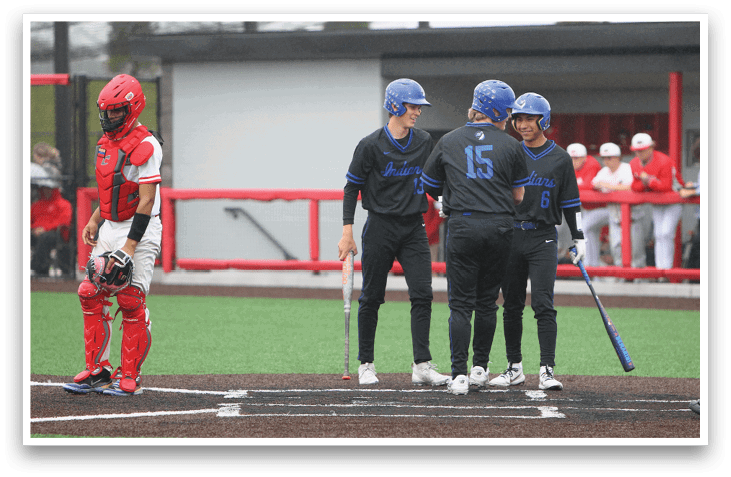 A group of baseball players on the field. Description generated by AI
