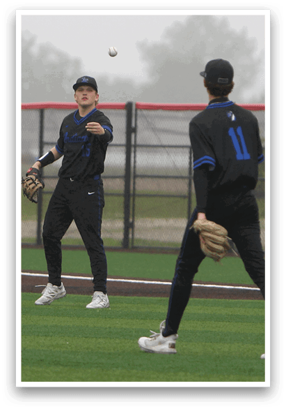 Two baseball players on a field. Description generated by AI