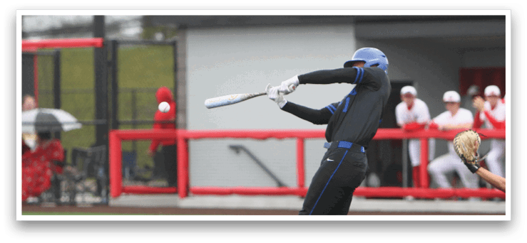 A baseball player is swinging a bat at a ball. Description generated by AI