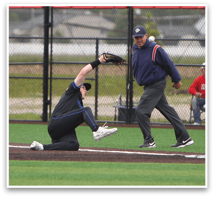 A baseball player slides into home plate. Description generated by AI
