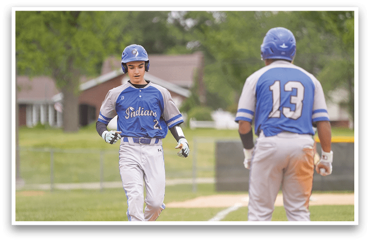 A baseball player wearing a blue helmet and blue and white uniform. Description generated by AI