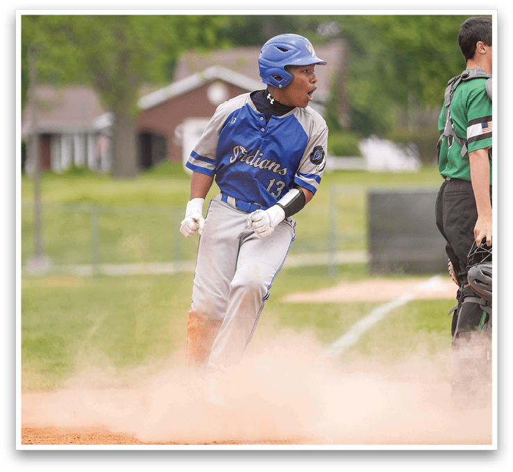 A baseball player running on the field. Description generated by AI