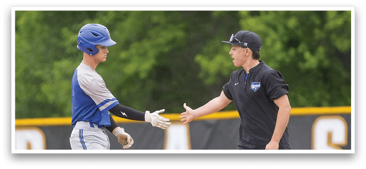 A baseball player shakes hands with an umpire. Description generated by AI