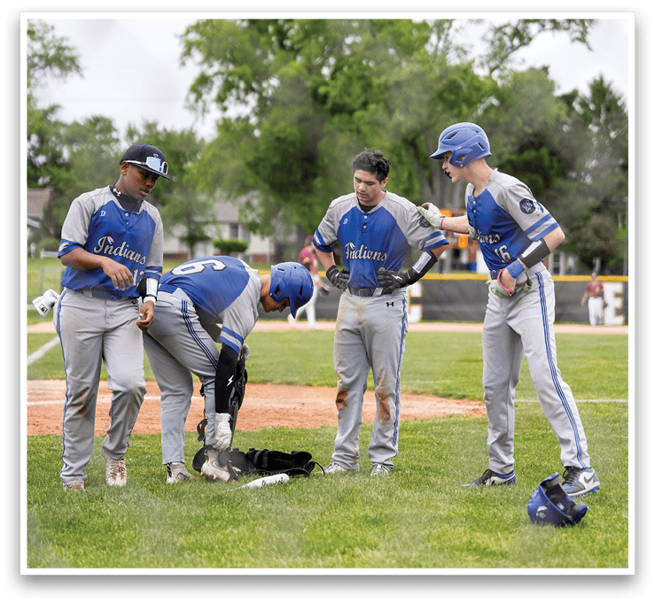 Baseball players on a field. Description generated by AI