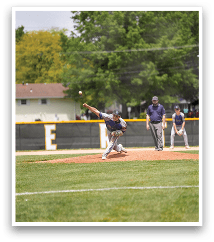 A baseball player is pitching a ball. Description generated by AI