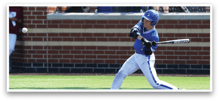 A baseball player is swinging a bat at a ball. Description generated by AI