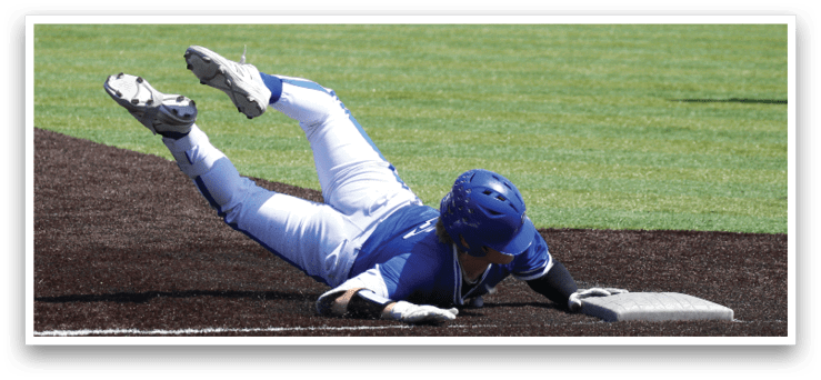 A baseball player slides into a base. Description generated by AI