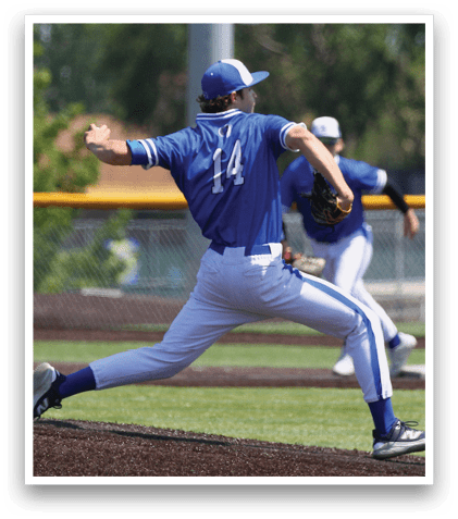 A baseball player wearing a blue and white uniform is pitching a ball. Description generated by AI